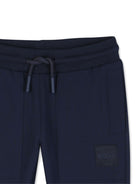 Pantaloni sportivi per neonato Boss Kids blu con logo sul davanti J53471 849 BOSS KIDS 