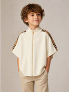 Mantella in lana per bambini Burberry Kids bianca con cerniera e finiture a quadri 8129144 A5933 BURBERRY KIDS 