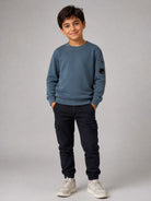 Felpa per bambino C.P. Company Kids blu con dettaglio lente sulla manica COF00XLCA76 41125 C.P.COMPANY KIDS 