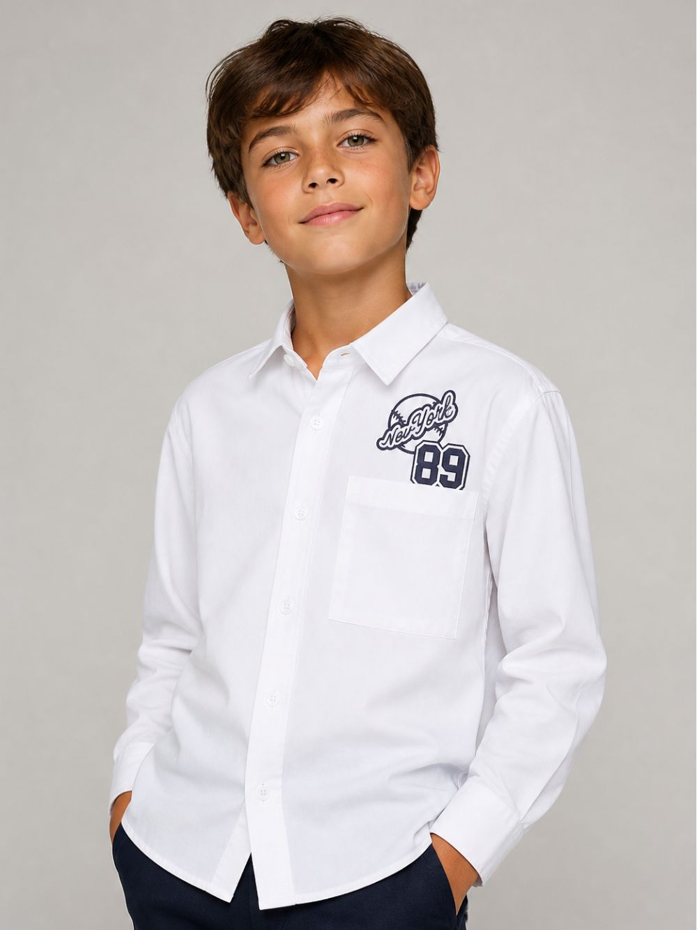 Camicia per bambino DKNY Kids bianca con stampa logo sul retro D62719 10P DKNY KIDS 