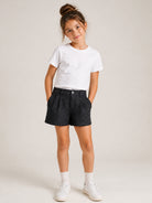 Shorts per bambina Dkny Kids in denim con glitter e pieghe D62780 Z11 DKNY KIDS 