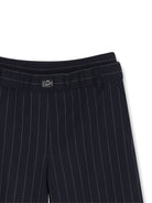 Pantaloni per bambina DKNY Kids blu con motivo gessato D62786 845 DKNY KIDS 