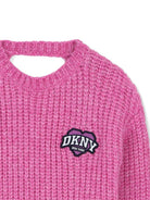 Maglione per bambina DKNY Kids rosa con dettaglio cut-out posteriore D62899 479 DKNY KIDS 