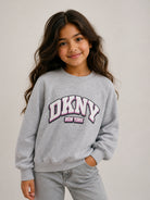 Felpa per bambina DKNY Kids grigia con applicazione logo D62905 A32 DKNY KIDS 