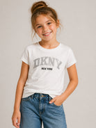 T-shirt per bambina DKNY Kids bianca con dettagli con strass D62912 117 DKNY KIDS 