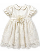 Abito per neonata Dolce & Gabbana Kids bianco con fiocco in rilievo sul davanti L24DT4 G7P4A S9000 DOLCE & GABBANA KIDS 