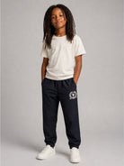 Pantaloni per bambino Dolce & Gabbana Kids blu con logo sul davanti L45P34 G7P6H S9000 DOLCE & GABBANA KIDS 