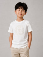 T-shirt per bambino Dolce & Gabbana Kids bianca con logo sul davanti L4JTHU G7P6R W0111 DOLCE & GABBANA KIDS 