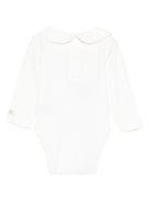 Tutina per neonato Donsje Kids bianca con orsetto ricamato sul davanti 3030101 00002 DONSJE KIDS 