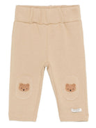 Pantaloni per neonato Donsje Kids beige con ricamo con orsetto 3040701 00077 DONSJE KIDS 