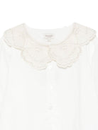 Camicetta per bambina Donsje Kids bianca con colletto smerlatoe e ricami floreali. 4125900 00029 DONSJE KIDS 