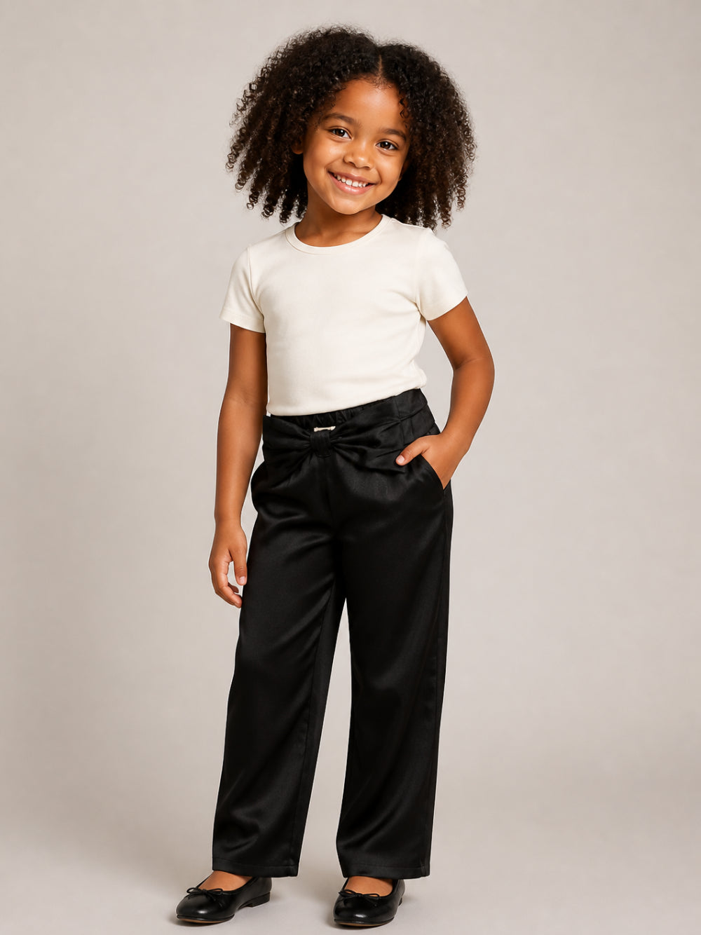 Pantaloni per bambina Douuod Kids neri con dettaglio fiocco sul davanti DZ6A31 Z4087 930 DOUUOD KIDS 