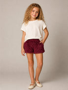 Shorts per bambina Douuod Kids bordeaux con finitura texturizzata DZ6A49 Z4089 429 DOUUOD KIDS 