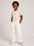 Pantaloni per bambino Eleventy Kids bianchi con patch con logo sul retro EZ6H90 I0233 101 ELEVENTY KIDS 