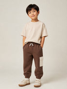 Pantaloni sportivi per bambino Eleventy Kids marroni con tasca cargo a contrasto EZ6I30 Z3999 320BG ELEVENTY KIDS 