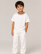 T-shirt per bambino Eleventy Kids bianca con girocollo a contrasto EZ8H11 Z3708 101 ELEVENTY KIDS 