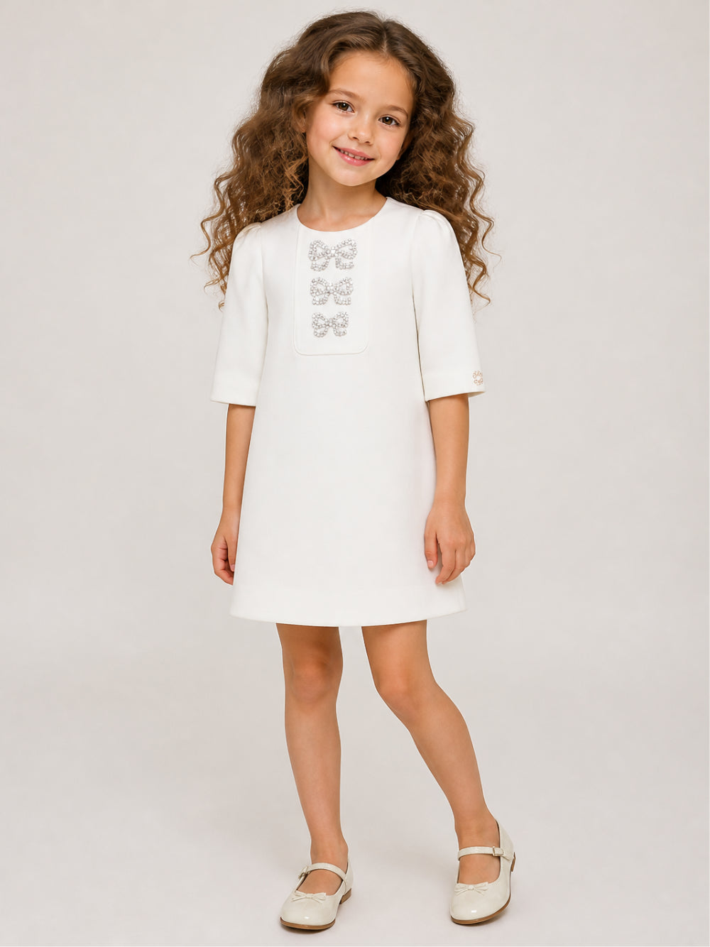 Abito per bambina Elie Saab Kids bianco con decorazioni fiocchi sul davanti EFAB135TS0802 WHT ElIE SAAB KIDS 