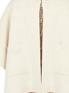 Poncho per bambina Fendi Kids beige con motivo con monogramma JFQ057 AO29 F0UQ1 FENDI KIDS 