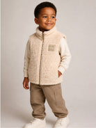 Gilet per bambino Fendi Kids beige con motivo logo FF all-over JUA279 AY8J F0WC4 FENDI KIDS 