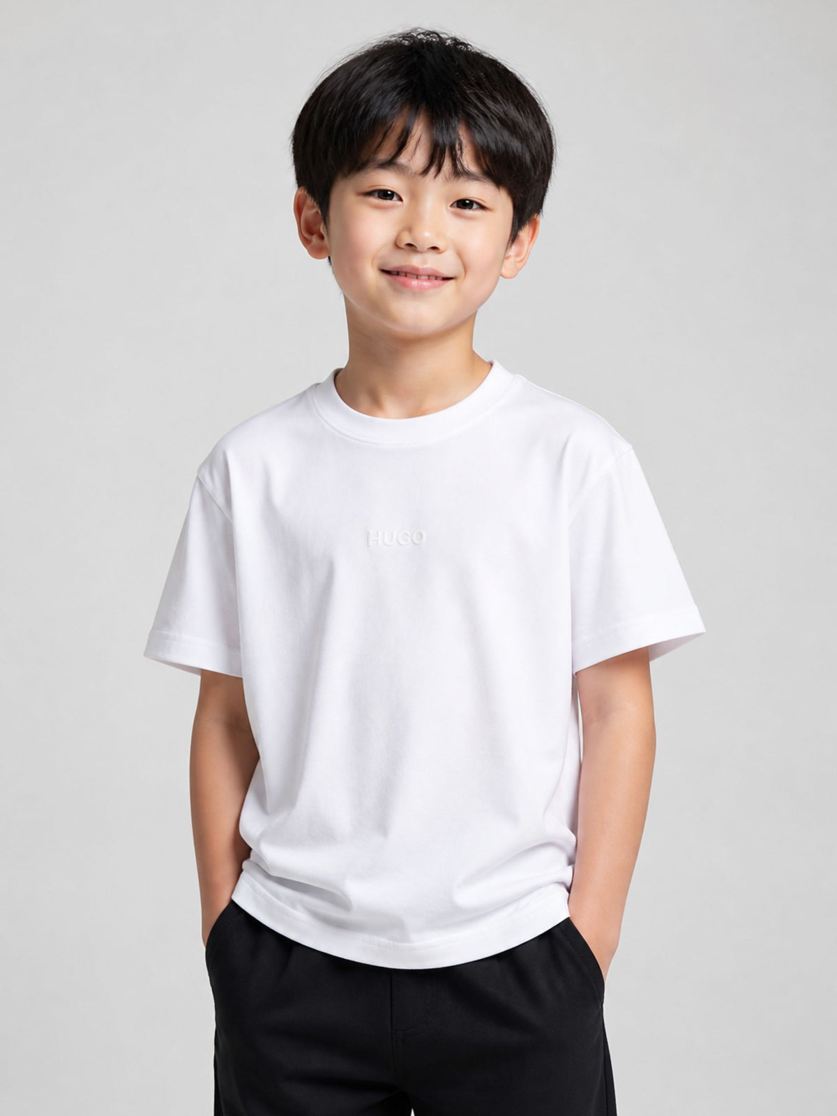 T-shirt per bambino Hugo Kids bianca con logo sul davanti G01240 10P Hugo KIDS 