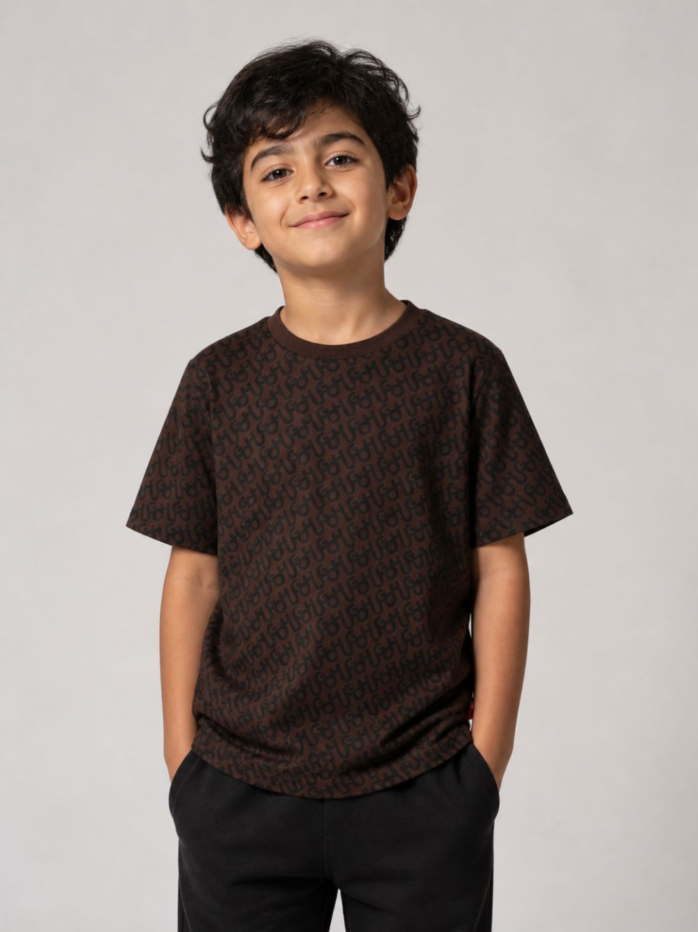 T-shirt per bambino Hugo Kids marrone con stampa monogramma all-over G01249 33G Hugo KIDS 
