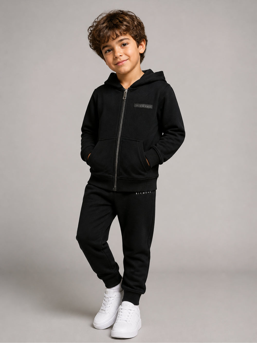 Tuta per bambino John Richmond Junior nera con cappuccio e logo RBA26018CF BLACK JOHN RICHMOND KIDS 