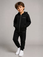 Tuta per bambino John Richmond Junior nera con cappuccio e logo RBA26018CF BLACK JOHN RICHMOND KIDS 