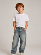 Jeans per bambino John Richmond Kids in denim con effetto sbiadito RBA26150JE DENIM DIRTY JOHN RICHMOND KIDS 