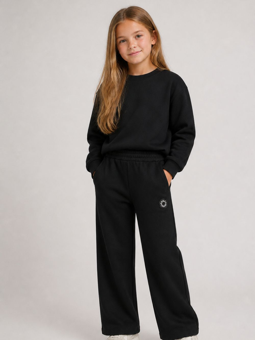 Pantaloni sportivi per bambina Kenzo Kids neri con applicazione frontale con logo K62006 09B KENZO KIDS 