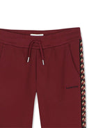 Pantaloni sportivi per bambina Lanvin Kids bordeaux con bande laterali N30425 955 LANVIN KIDS 