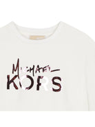 T-shirt per bambina Michael Kors Kids bianca con stampa logo metallizzato sul davanti R30686 117 MICHAEL KORS KIDS 