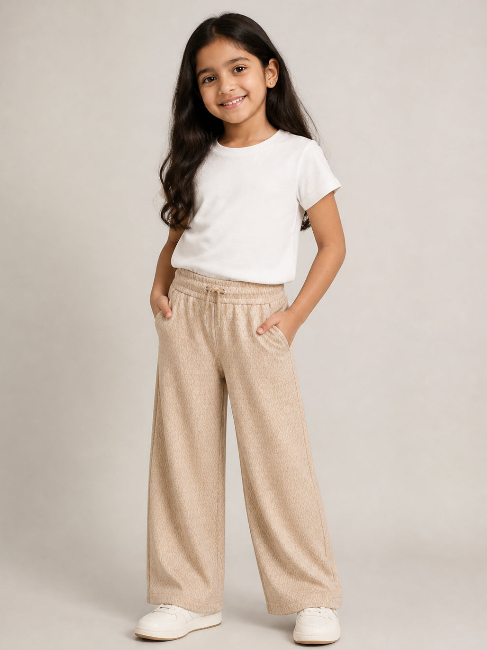 Pantaloni per bambina Michael Kors Kids beige con motivo monogramma all-over R30698 301 MICHAEL KORS KIDS 