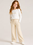 Pantaloni per bambina Michael Kors Kids beige con logo sul davanti R30700 247 MICHAEL KORS KIDS 