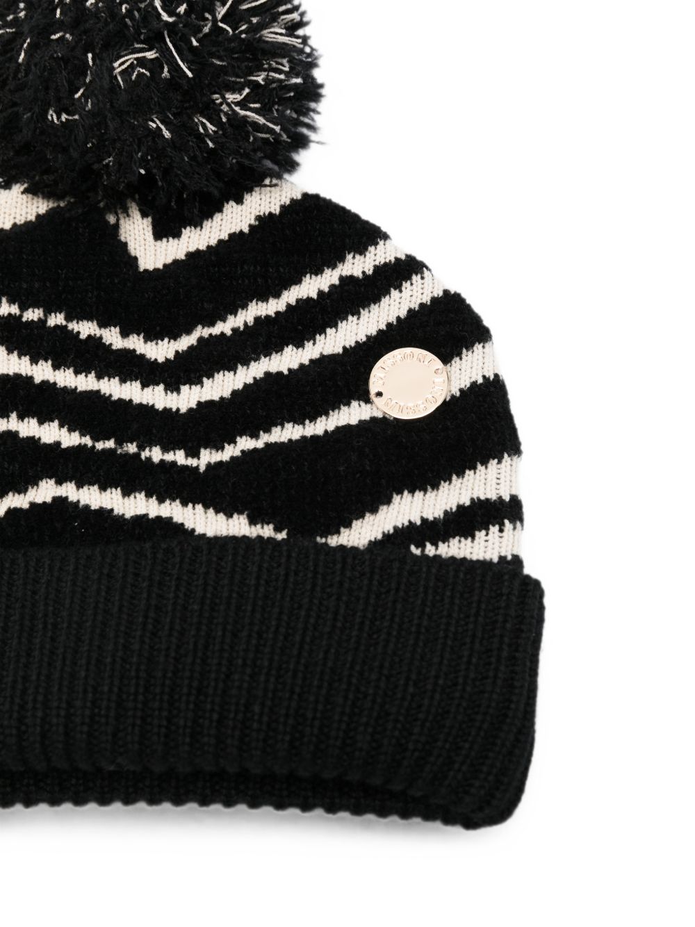 Cappello per bambina Missoni Kids bianco e nero con pompom MZ0B07 W0028 930BG MISSONI KIDS 