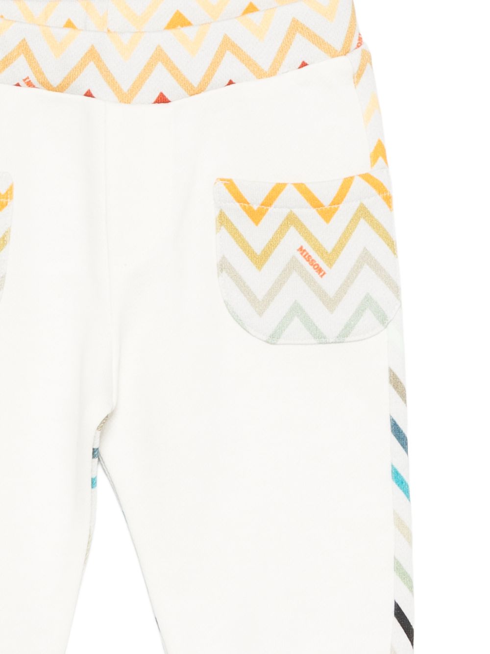 Pantaloni sportivi per neonato Missoni Kids bianchi con motivo a zigzag MZ6300 Z3183 102MC MISSONI KIDS 