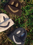 Berretto per bambino Molo Kids beige con motivo smile 7W26S303 5645 MOLO KIDS 
