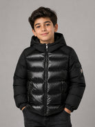 Giubbino Hyoseris per bambino Moncler Kids nero con effetto glossy L29541A00076597YX 999 MONCLER KIDS 