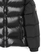 Giubbino Hyoseris per bambino Moncler Kids nero con effetto glossy L29541A00076597YX 999 MONCLER KIDS 