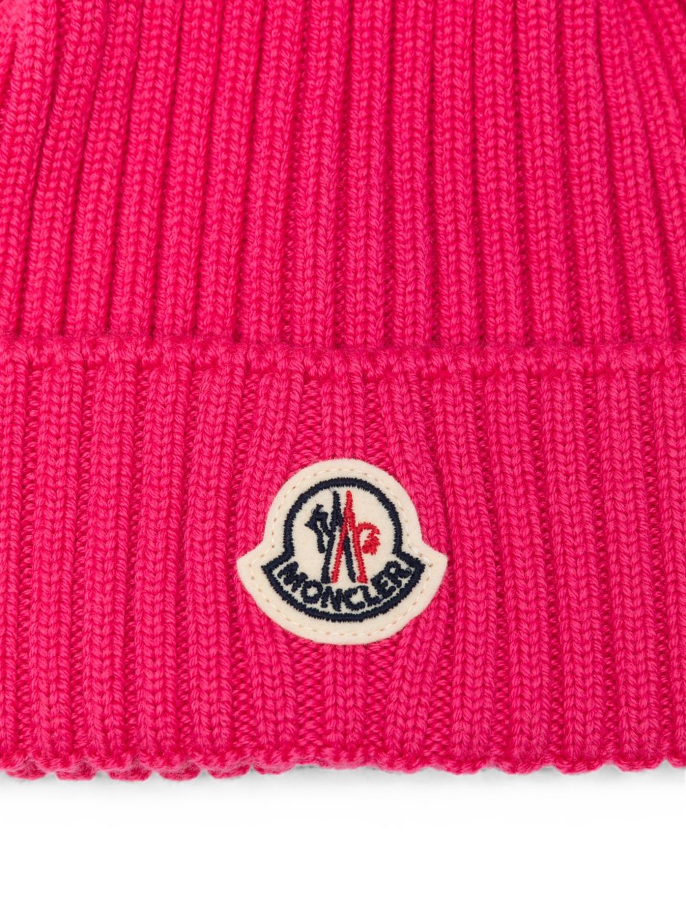 Cappello per bambina Moncler Enfant fucsia con ponpon L29543B00007A9327 N55 MONCLER KIDS 