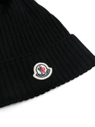 Berretto per bambini Moncler Enfant nero con pompon L29543B00007M1131 999 MONCLER KIDS 