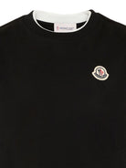 T-shirt per bambino Moncler Enfant nera con dettaglio logo L29548C0000889AFV 999 MONCLER KIDS 