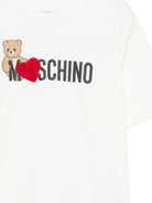 T-shirt per bambina Moschino Kids bianca con stampa Teddy sul davanti H1M060LBA11 10063 MOSCHINO KIDS 