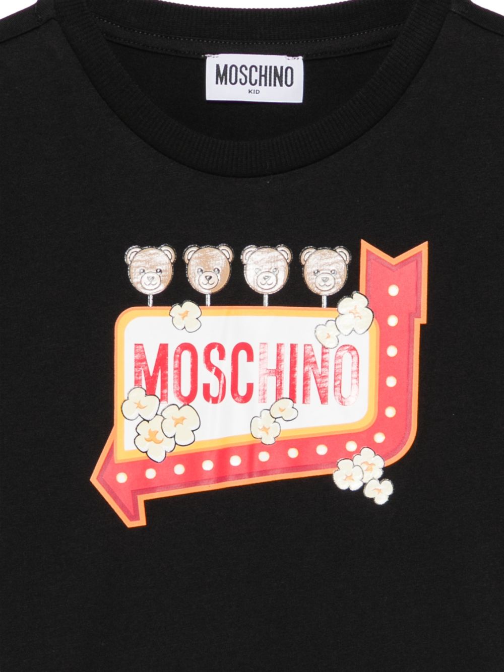 T-shirt per bambini Moschino Kids nera con stampa grafica sul davanti H5M058LAA59 60100 MOSCHINO KIDS 