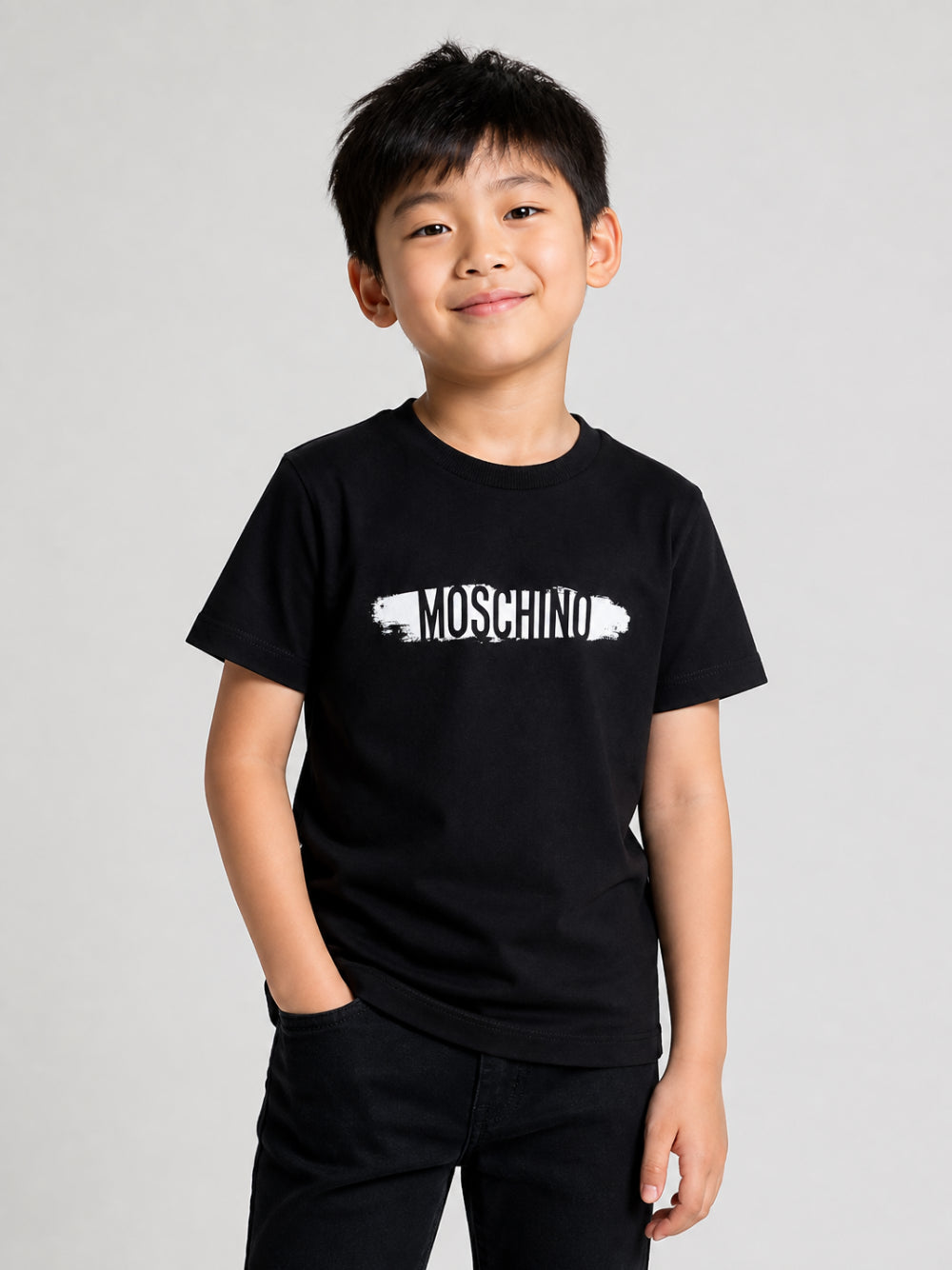T-shirt per bambini Moschino Kids nera con stampa logo sul davanti H8M058LAA10 60100 MOSCHINO KIDS 