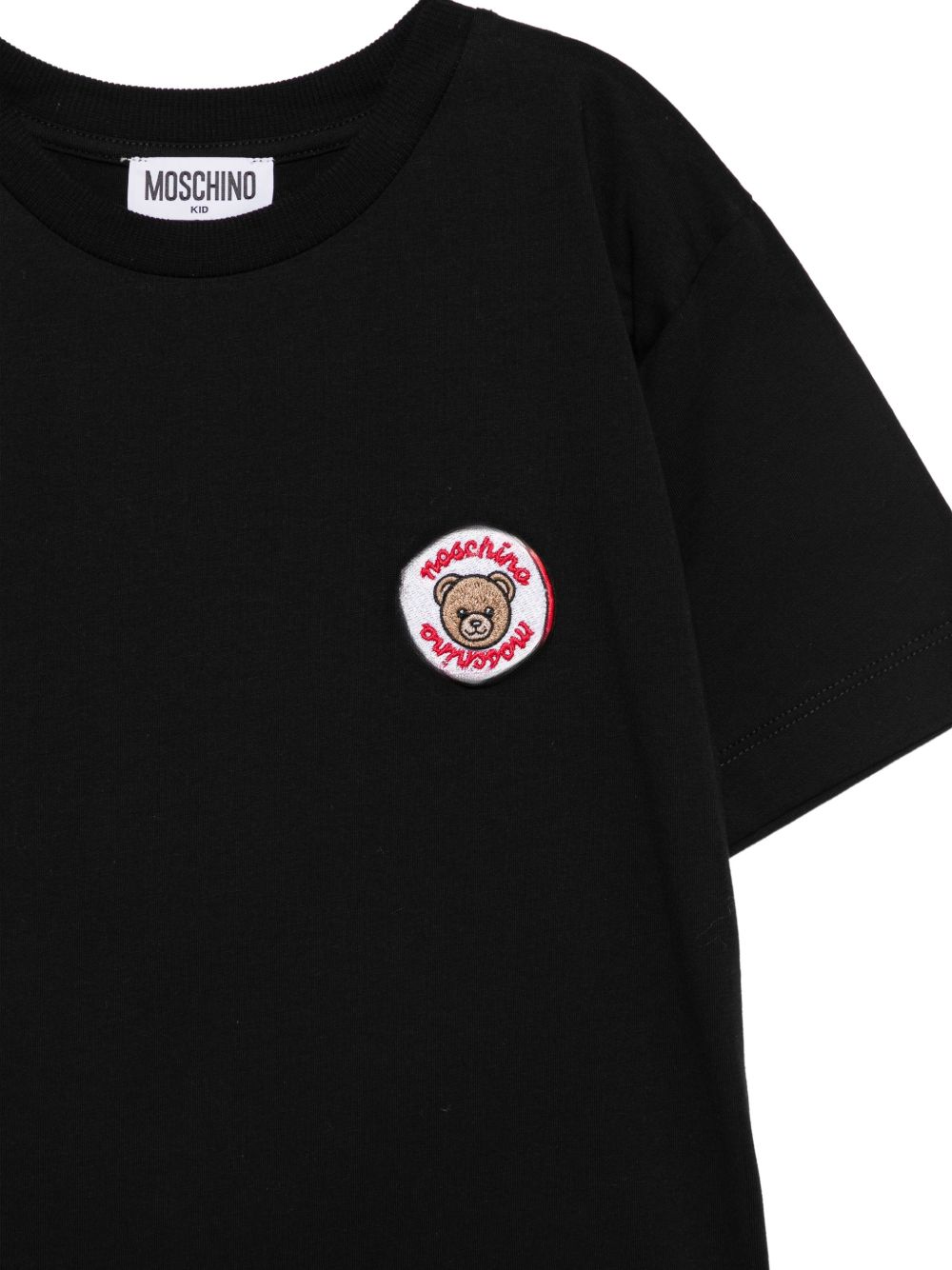 T-shirt per bambini Moschino Kids nera con Teddy Bear applicato sul petto H9M05GLAA59 60100 MOSCHINO KIDS 