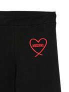 Pantaloni per bambina Moschino Kids neri con stampa cuore con logo HDP07CLBA11 60100 MOSCHINO KIDS 