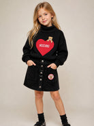 Maglione per bambina Moschino Kids nero con logo intarsiato sul davanti HDW02JLHE77 60100 MOSCHINO KIDS 