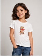 T-shirt per bambina Moschino Kids bianca con stampa grafica HIM06KLBA11 10063 MOSCHINO KIDS 