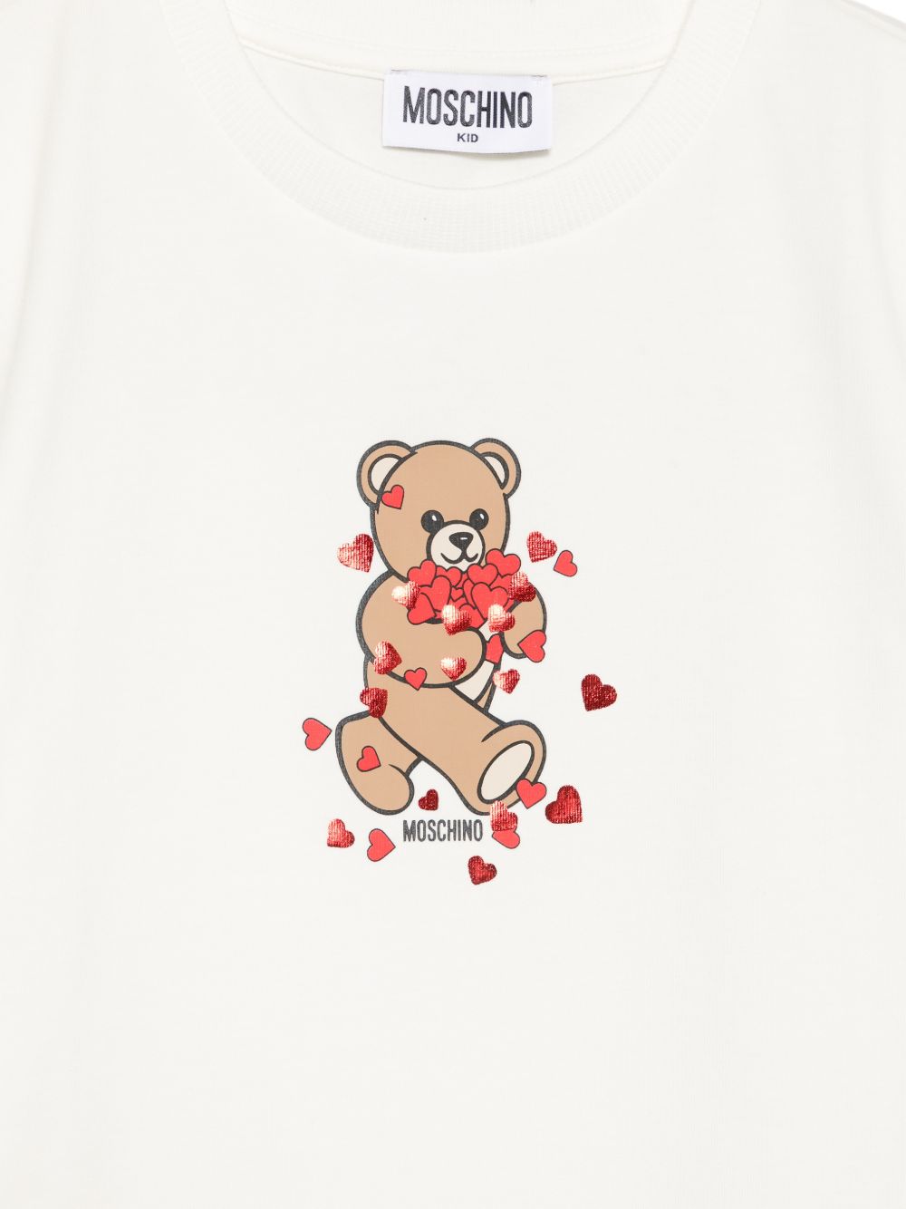 T-shirt per bambina Moschino Kids bianca con stampa grafica HIM06KLBA11 10063 MOSCHINO KIDS 