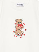 T-shirt per bambina Moschino Kids bianca con stampa grafica HIM06KLBA11 10063 MOSCHINO KIDS 